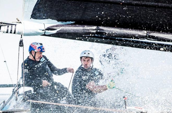 Full spray to the face for Red Bull Sailing Team skipper, Roman Hagara, during an intense day of racing on the final day in Muscat, where the team finished in fourth on the Act leaderboard. - Extreme Sailing Series © Lloyd Images http://lloydimagesgallery.photoshelter.com/